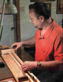 Gerry is using a Unique Custom Jig for the Re-Hairing of Bows!